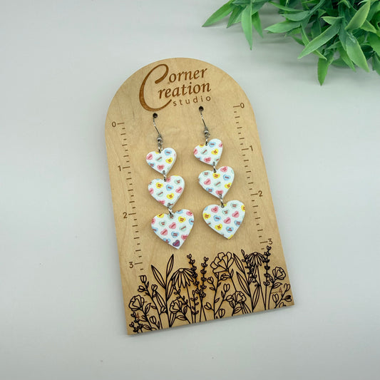 Conversational Cascading Heart Earrings